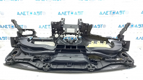 Боковой вид торпеды без AIRBAG для Chevrolet Volt, на поверхности видны следы использования.
