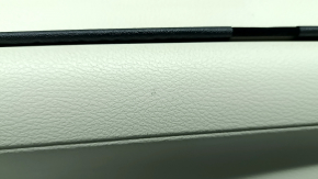 Внутренняя сторона обшивки двери Toyota Sienna 2021-2026, показаны крепления и звуковая изоляция.
