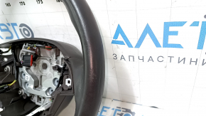 Полный вид рулевого колеса для Lincoln MKC, штамповка и логотипы на креплениях.