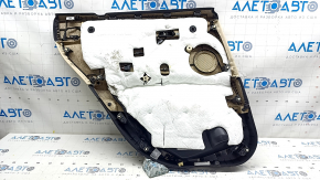 Деталь обшивки с ручкой двери BMW X1 F48, кожа Dakota, заметные следы эксплуатации
