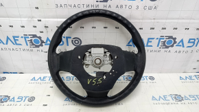 Боковой вид рулевого колеса Toyota Camry, видно состояние обшивки и детали.