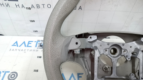 Общий вид руля Toyota Sienna 2010-2020, фокус на деталях механизма.
