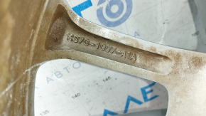 Задняя часть диска с производственной маркировкой для модели Ford Fusion.