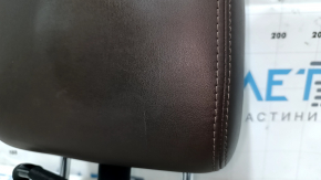 Потертости на коже подголовника Infiniti JX35/QX60 2013-2020, вид спереди.