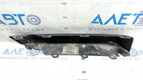 Нижняя накладка решетки переднего бампера для BMW X3 G01 2018-2023, ракурс снизу с явными следами использования.