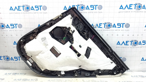 Обшивка дверей картка задня ліва BMW X5 G05 19-23 шкіра schwarz/ELFENBEINWEISS без шторки, вставка під дерево Fineline Stripe, підлокітник шкіра бежева, з ручкою та накладками, прим'ята, тичка