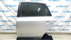 Двері в зборі задні ліві Toyota Prius V 12-17 срібло 1F7