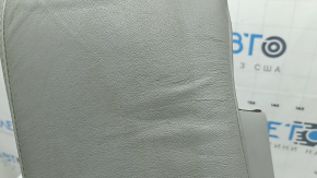 Потёртости и примятости на боковушке заднего сидения Toyota Camry 10-11 года.