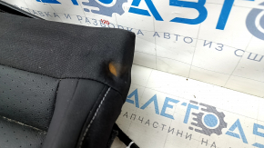 Деталь с небольшими дефектами на краю; рядом виден логотип Volkswagen