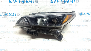 Фара передня ліва в зборі Nissan Leaf 18-24 галоген з кріпленням пісок