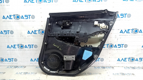 Вид с внутренней стороны обшивки двери Nissan Leaf 18-21, требует небольшого внимания.