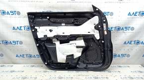 Вид задней стороны обшивки двери передней правой Mazda CX-5, видно крепление и звуковую систему BOSE.