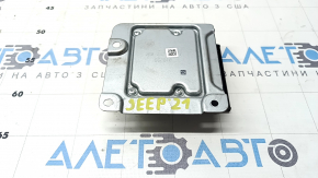 Модуль SRS airbag для Jeep Grand Cherokee 2021-2026, маркировка и состояние на фото без повреждений.