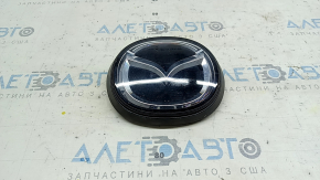 Эмблема решетки радиатора Mazda 3 19-26 под радар, песок