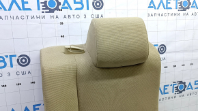Деталь интерьера Toyota Camry, крупный план спинки сидения, ткань с небольшими потертостями.