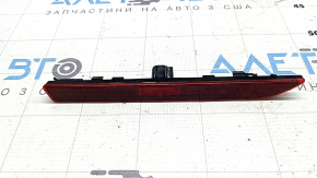 Відбивач заднього бампера бічний лівий Lincoln MKZ 13-20 габарит, тріщина у кріпленні, окислення фішки, контакт з водою, робоча