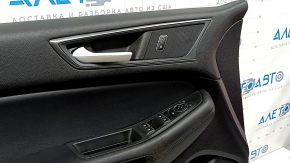 Обшивка двери карточка передняя левая Ford Edge 19-21 черная, SE, вставка кожа черная, подлокотник кожа черная, у управлением стеклоподъемника и кнопкой центр замка, с ручкой, под чистку