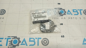 Заглушка буксировочного крюка переднего бампера Mazda 3 14-16 BM дорест