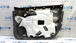 Дверная обшивка переднего левого ряда Chevrolet Volt, вид с обратной стороны.