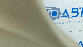 Текстура бежевой обшивки арки Jeep Grand Cherokee WK2, высокое разрешение для оценки состояния.