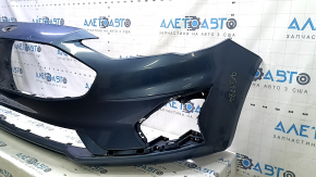 Бампер Ford Fusion с повреждениями, вид сбоку.