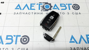 Вид ключа Lincoln MKZ с открытым механическим ключом, присутствуют видимые дефекты.
