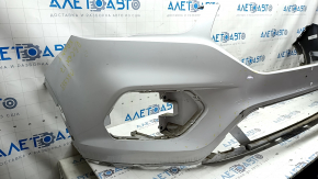 Общий вид бампера Ford Escape 17-19, с повреждениями и незаводскими отверстиями.