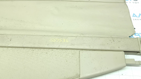 Ближний план оригинального номера 857536 на шторке для Lexus RX 2004-2009, видно следы использования