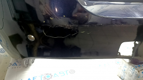 Фрагмент бампера BMW X3 F25 с повреждением, вид сбоку.