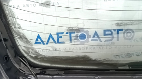 Стекло на двери багажника Lexus RX, вид с внутренней стороны.