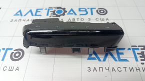 Деталь управления с функциональными кнопками для Kia EV6 2022-2026, вид спереди без дефектов, но с использованием.