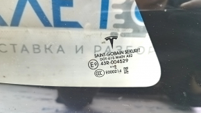 Стекло боковой форточки для Tesla Model 3 2018-2023, маркировка Saint-Gobain Sekurit.