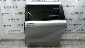 Двері в зборі задня ліва Toyota Sienna 21-26 keyless, тонування, срібло 1J9, тички на хромі