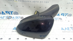 Вид черного бокового зеркала Ford Fusion mk5 2013-2020, подогрев и электрическая регулировка, в хорошем состоянии.