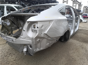 Задняя правая четверть кузова Toyota Avalon 2013 года выпуска, вид сзади, показывает состояние детали.