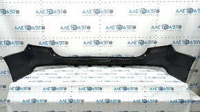 Фотография заднего бампера Volvo XC90, крупный план, видно повреждения.