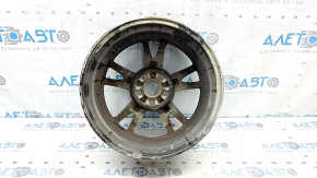 Диск дляToyota Prius 2010-2015, вид сбоку с коррозией и следами эксплуатации.