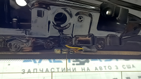 Элемент крепления в двери багажника BMW X1, внутренний вид.