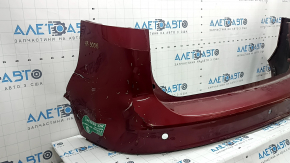 Задний бампер для Ford C-Max MK2, вид с боку, заметны повреждения.