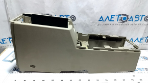 Консоль центральная нижняя часть Infiniti FX35 FX45 03-06 бежевая, царапины, сломана направляйка, сломан корпус