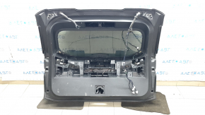 Внутренняя сторона двери багажника Nissan Rogue, с проводкой, в хорошем состоянии.
