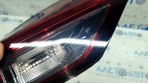 Фонарь внутренний дверь багажника левый Nissan Rogue 21-26 галоген + LED, царапины