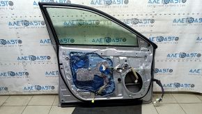 Дверь в сборе передняя левая Toyota Camry v55 15-17 usa, серебро 1J9, тычки, царапины