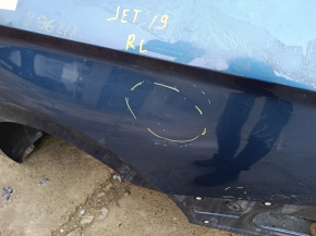 Угол задней левой четверти кузова VW Jetta 2019-2026 с заметными повреждениями.