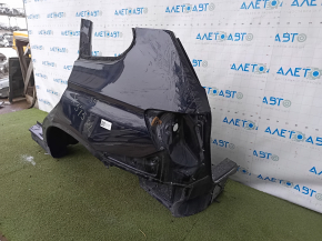 Задняя левая четверть кузова BMW X3 F25 в черном цвете, с небольшими потертостями и царапинами.