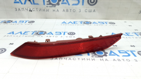 Відбивач заднього бампера лівий Mazda CX-9 16-23 тріснуть, потертий