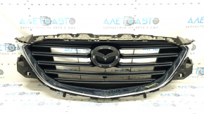 Решетка радиатора grill Mazda CX-9 16-19 без эмблемы, с подиумом, треснута, после ремонта, сломаны крепления