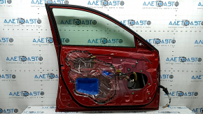 Внутренний вид двери передней левой от Toyota Camry, присутствуют все необходимые компоненты.