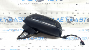 Зеркало боковое Audi Q5, ракурс с задней стороны, для оценки целостности корпуса.