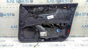 Вид внутренней стороны обшивки двери с подключениями и крепежами Audi A5